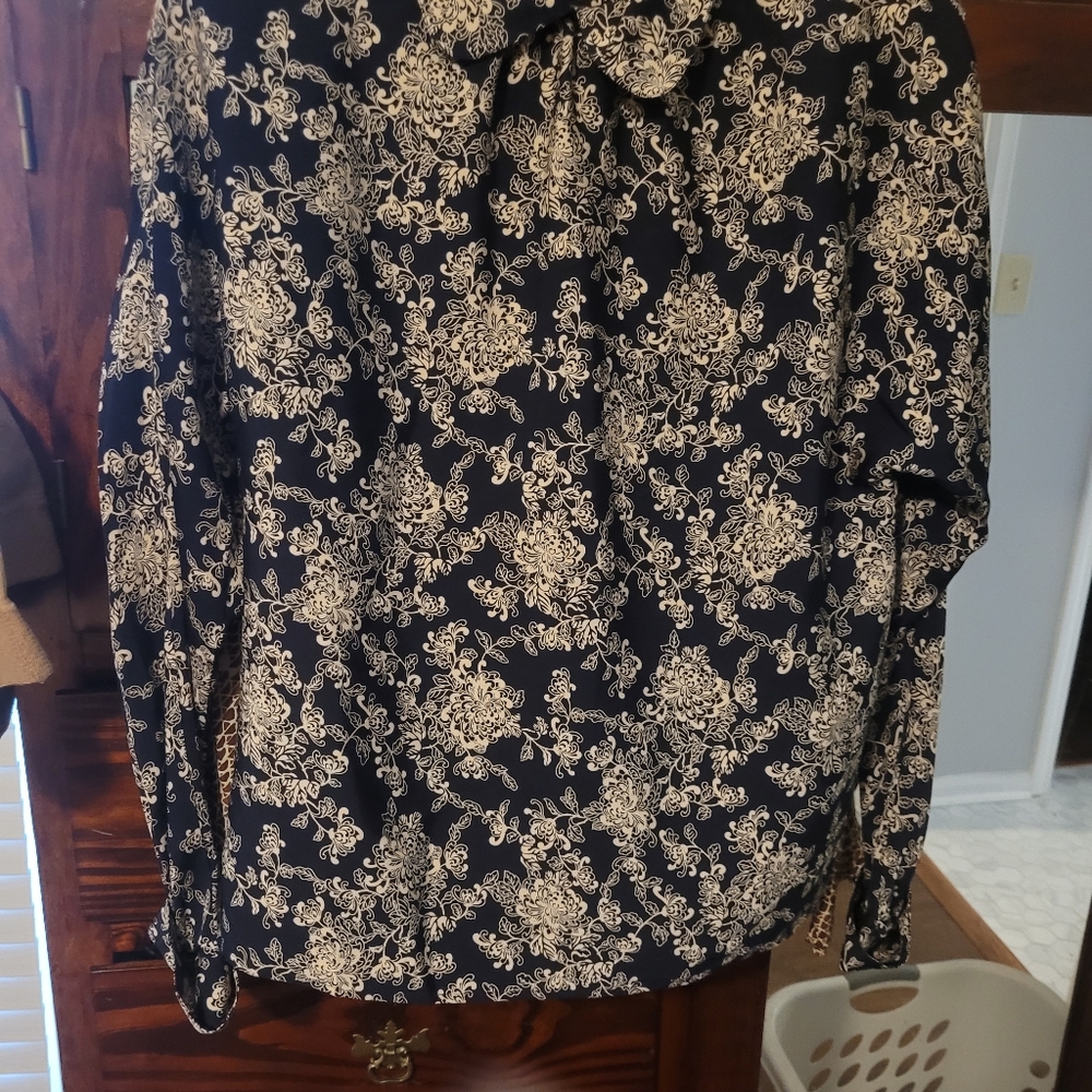 Navy long sleeved blouse with ivory floral print